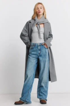 Abrigo largo bolsillos diagonales