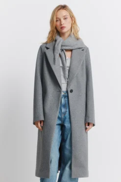 Abrigo largo bolsillos diagonales