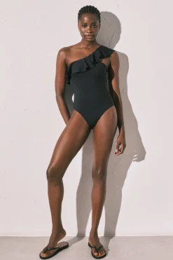 Ba&ntilde;ador moldeador volante asim&eacute;trico negro