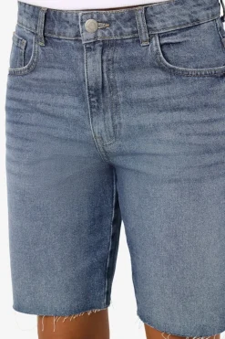 Bermuda vaquera con detalle de rotos