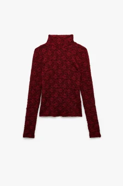 Blusa de encaje texturizada