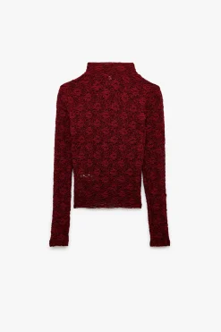 Blusa de encaje texturizada