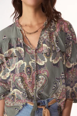 Blusa estampada volante