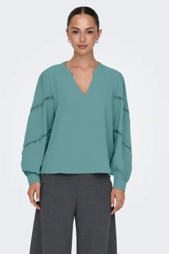 Blusa manga larga bordada