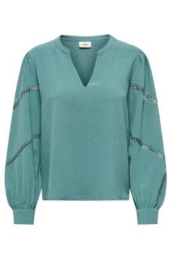 Blusa manga larga bordada