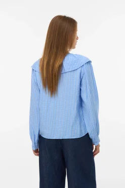 Blusa manga larga de mujer con volantes