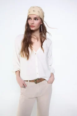 Blusa plisada fluida