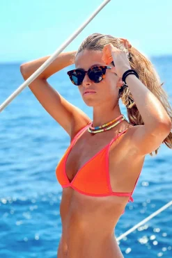 Braga bikini cl&aacute;sica ribetes fl&uacute;or