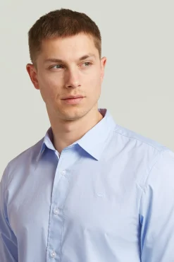 Camisa de manga larga y corte ajustado