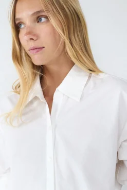 Camisa popel&iacute;n asim&eacute;trica