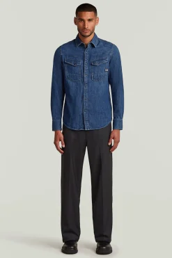 Camisa vaquera de manga larga y corte ajustado