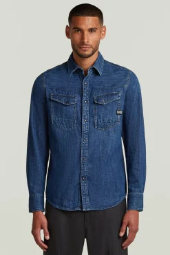 Camisa vaquera de manga larga y corte ajustado