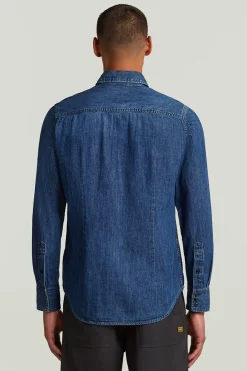 Camisa vaquera de manga larga y corte ajustado