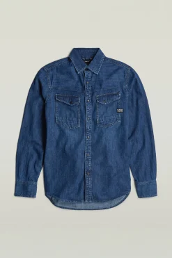 Camisa vaquera de manga larga y corte ajustado