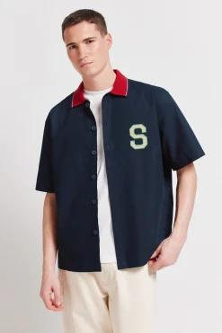 Camisa varsity manga corta