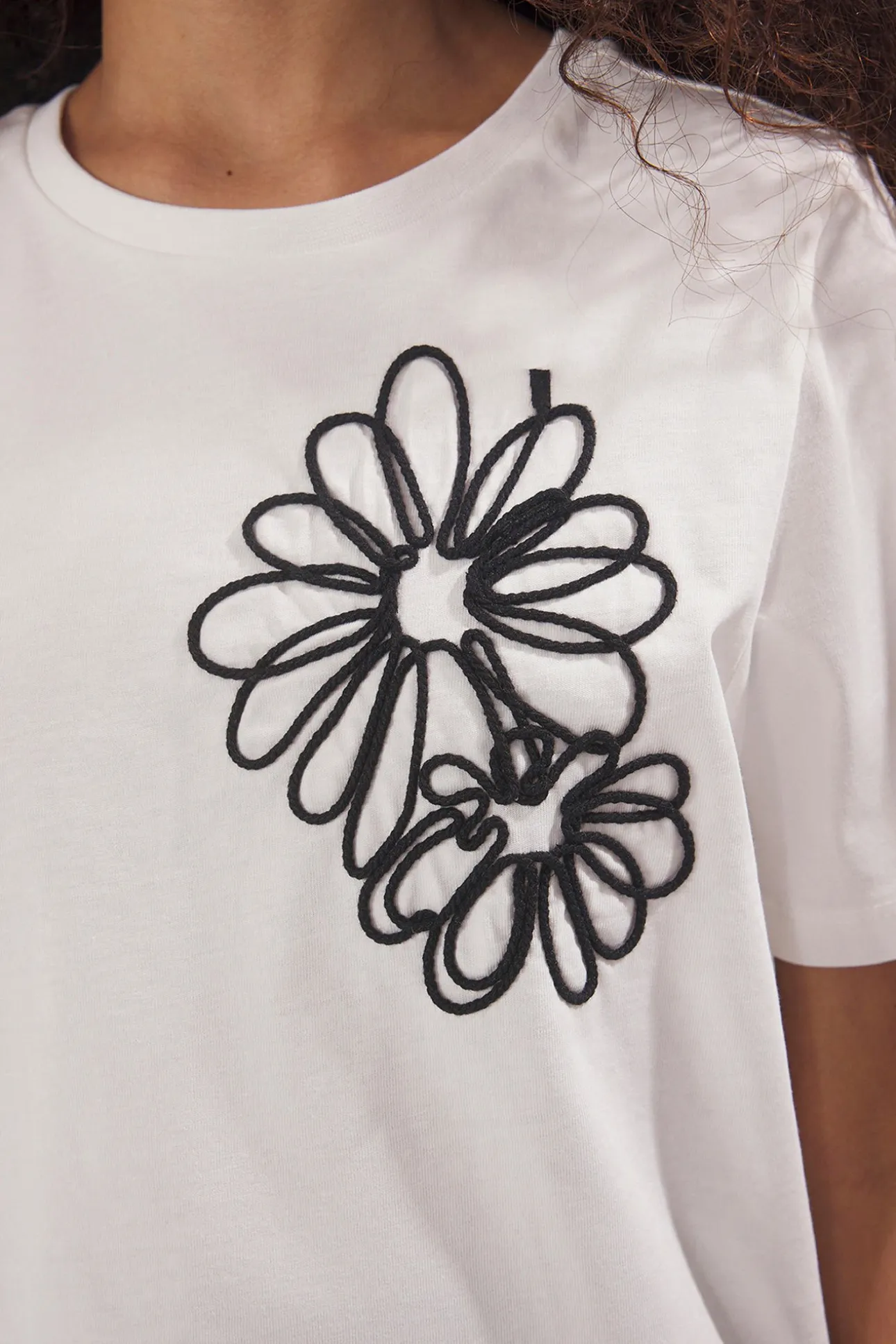 Camiseta flor manga corta