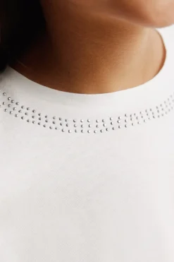 Camiseta manga larga tachas hombro descubierto ni&ntilde;a