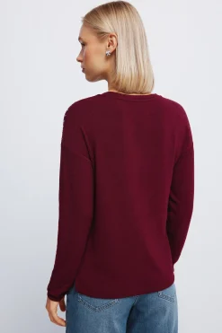 Camiseta punto cortado tachas