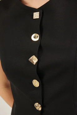 Chaleco abotonado sin mangas