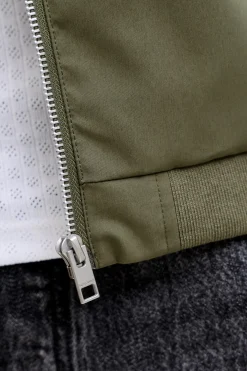 Chaqueta Harrington cuello alto