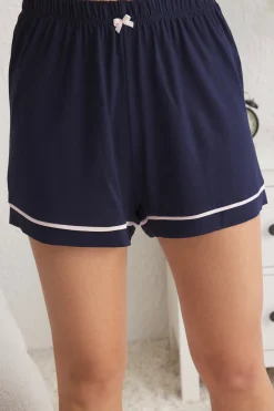 Conjunto de pijama corto lencero lazos