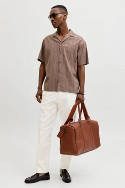 Pantalón chino relaxed tiro medio