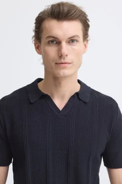 Polo de punto con cuello pico