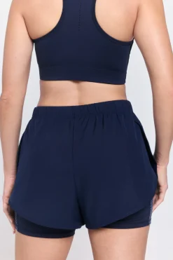 Short running deportivo reflectante