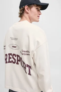 Sudadera cropped athletic essentials