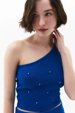 Top asim&eacute;trico