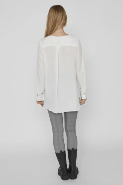 Top de mujer de manga larga con escote en pico